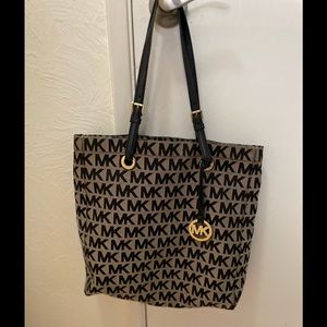 Michael Kors | Black/Beige Signature Canvas, North South Tote with  Logo Charm